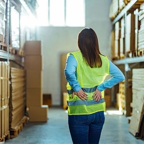 worker suffering from backpain